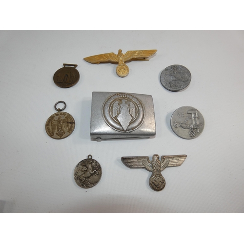 347 - A COLLECTATION OF EIGHT NAZI GERMANY WORLD WAR II BADGES, BELT BUCKLE AND MEDALS ETC