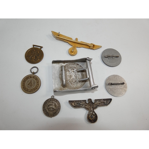 347 - A COLLECTATION OF EIGHT NAZI GERMANY WORLD WAR II BADGES, BELT BUCKLE AND MEDALS ETC