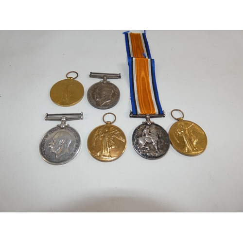 360 - A COLLECTION OF THREE WORLD WAR I MEDAL PAIRS AWARDED TO 31178 PRIVATE T.A. McNABOE MANCHESTER REGIM... 