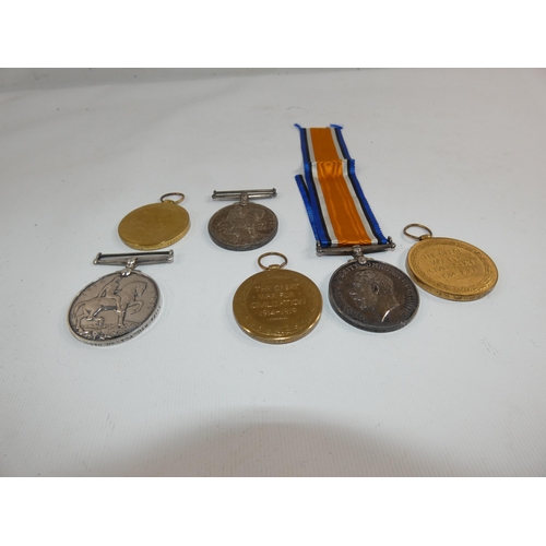 360 - A COLLECTION OF THREE WORLD WAR I MEDAL PAIRS AWARDED TO 31178 PRIVATE T.A. McNABOE MANCHESTER REGIM... 