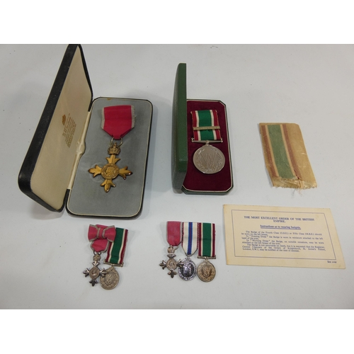 363 - A CASED CIVIL O.B.E., WOMENS VOLUNTARY SERVICE MEDAL AND TWO SETS OF MINIATURE MEDALS