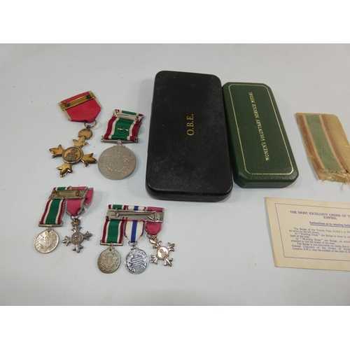 363 - A CASED CIVIL O.B.E., WOMENS VOLUNTARY SERVICE MEDAL AND TWO SETS OF MINIATURE MEDALS