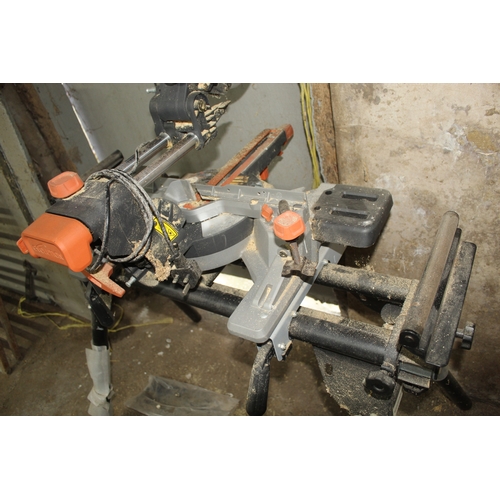 31 - AN EVOLUTION MITRE CHOP SAW ON STAND  + VAT