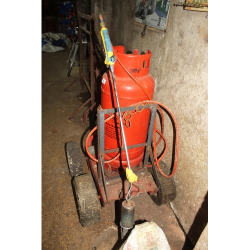 49 - A GAS BURNER ON 4 WHEEL TROLLEY  + VAT