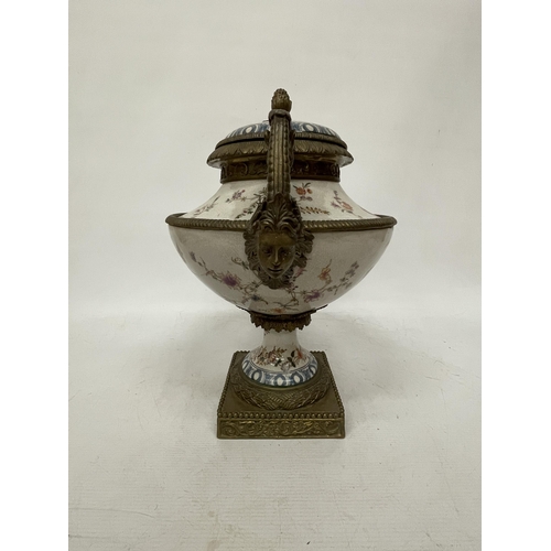 1 - A LARGE PORCELAIN URN WITH BRONZE ACCENTS, POSSIBLY CHINESE.  FEATURING A FLORAL DESIGN WITH ANIMAL ... 