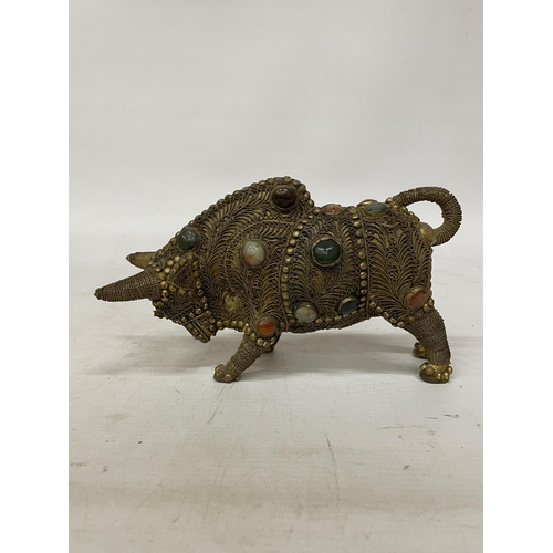 14 - A TIBETAN BRASS FILIGREE MODEL OF A BULL WITH INLAID SEMI PRECIOUS STONES, HEIGHT 13CM, LENGTH 21CM