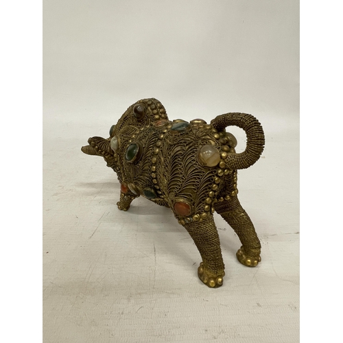 14 - A TIBETAN BRASS FILIGREE MODEL OF A BULL WITH INLAID SEMI PRECIOUS STONES, HEIGHT 13CM, LENGTH 21CM