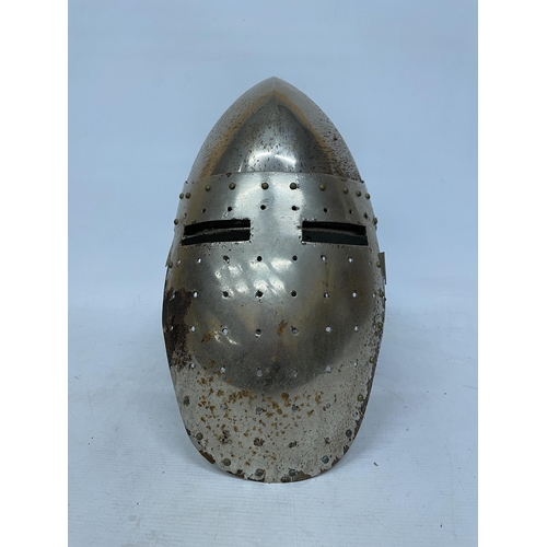 16 - A REPLICA STEEL MEDIEVAL HELMET