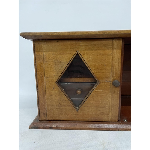 17 - AN EARLY 20TH CENTURY MAHOGANY SMOKERS CABINET WITH TWO DRAWERS AND GLAZED PANELS TO THE FRONT, HEIG... 