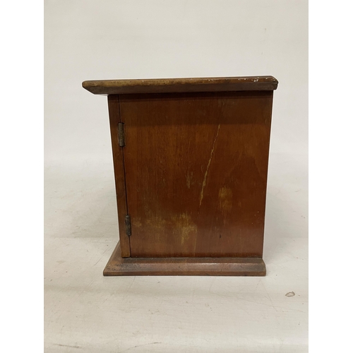 17 - AN EARLY 20TH CENTURY MAHOGANY SMOKERS CABINET WITH TWO DRAWERS AND GLAZED PANELS TO THE FRONT, HEIG... 