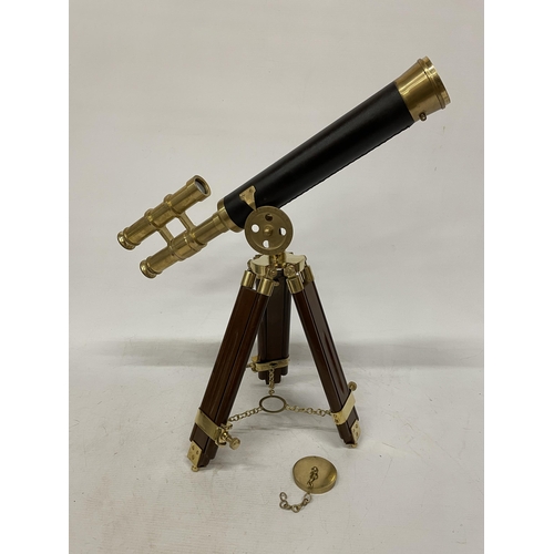 18 - A WOOD AND BRASS TELESCOPE WITH SIGHTS AND TRIPOD LEGS