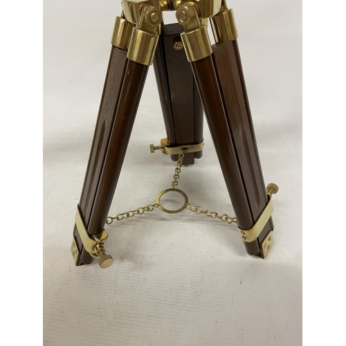 18 - A WOOD AND BRASS TELESCOPE WITH SIGHTS AND TRIPOD LEGS