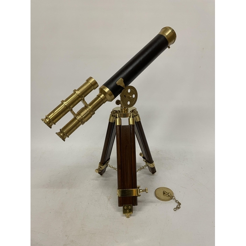 18 - A WOOD AND BRASS TELESCOPE WITH SIGHTS AND TRIPOD LEGS