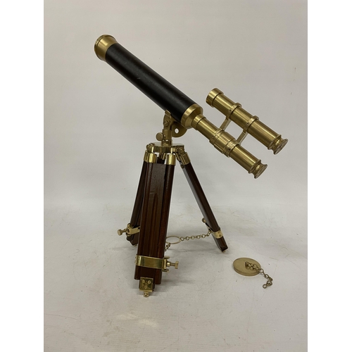 18 - A WOOD AND BRASS TELESCOPE WITH SIGHTS AND TRIPOD LEGS