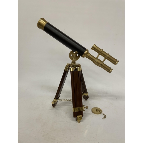 18 - A WOOD AND BRASS TELESCOPE WITH SIGHTS AND TRIPOD LEGS