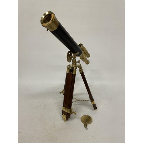 18 - A WOOD AND BRASS TELESCOPE WITH SIGHTS AND TRIPOD LEGS