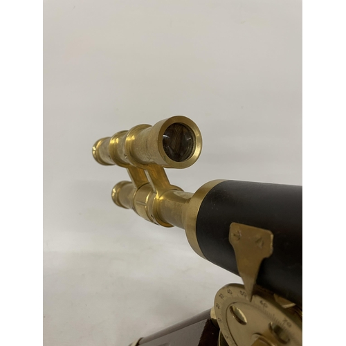 18 - A WOOD AND BRASS TELESCOPE WITH SIGHTS AND TRIPOD LEGS