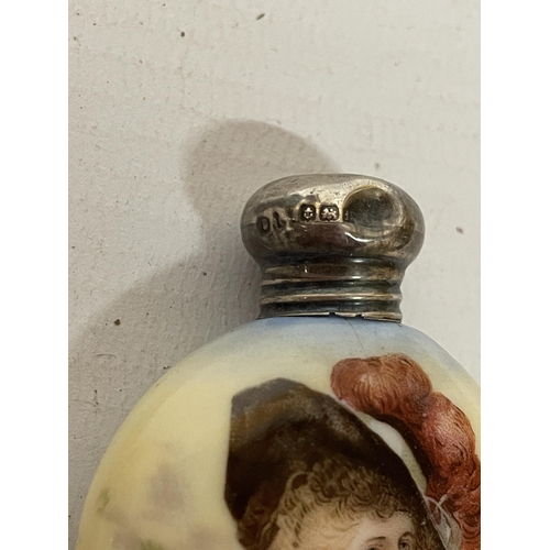 35 - A LATE 19TH CENTURY CERAMIC SCENT BOTTLE WITH LADY DECORATION WITH A HALLMARKED BIRMINGHAM SILVER TO... 