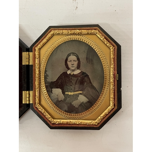 37 - A 19TH CENTURY PHOTOGRAPH OF A LADY, IN AN ELABORATELY DECORATED FRAME