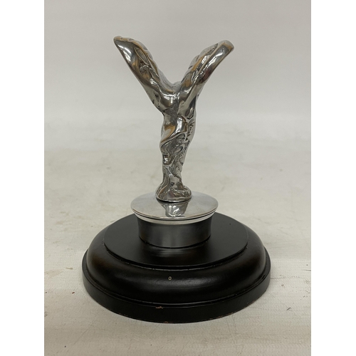 38 - A CHROME FLYING LADY ON A BASE, HEIGHT 14CM