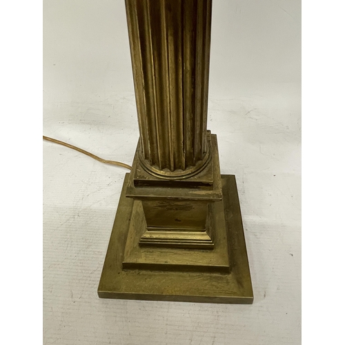 43 - A LARGE BRASS OIL LAMP WITH CORINTHIAN COLUMN, CONVERTED TO ELECTRIC, WITH SHADE, HEIGHT APPROX 64CM