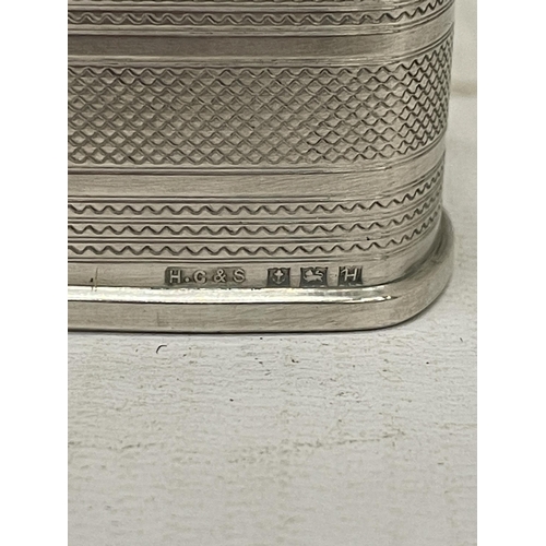 8 - FOUR HALLMARKED BIRMINGHAM SILVER ITEMS TO INCLUDE TWO NAPKIN RINGS AND TWO DECANTER LABELS