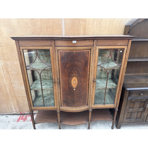 3245 - AN EDWARDIAN MAHOGANY AND INLAID SHERATON REVIVAL BOW FRONTED CHINA CABINET ON OPEN BASE WITH TAPERI... 