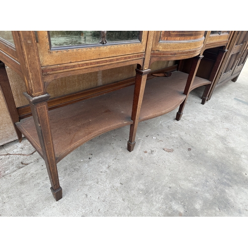 3245 - AN EDWARDIAN MAHOGANY AND INLAID SHERATON REVIVAL BOW FRONTED CHINA CABINET ON OPEN BASE WITH TAPERI... 