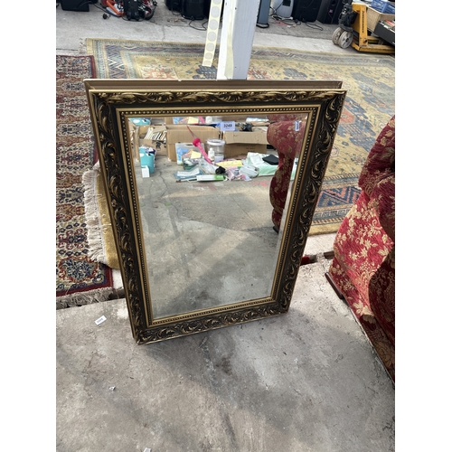 3249 - A GILT FRAMED BEVEL EDGE MIRROR