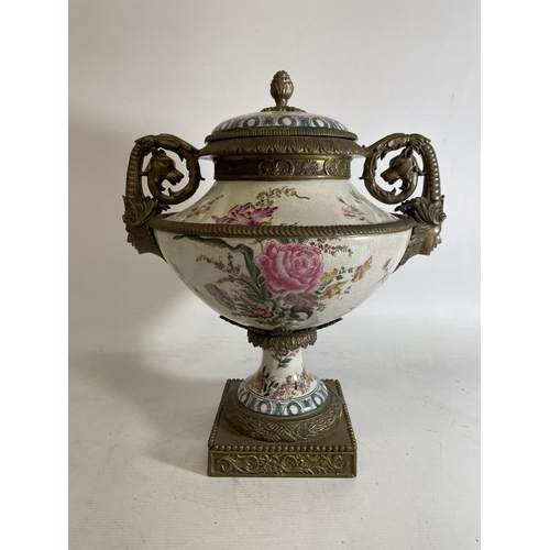 1 - A LARGE PORCELAIN URN WITH BRONZE ACCENTS, POSSIBLY CHINESE.  FEATURING A FLORAL DESIGN WITH ANIMAL ... 