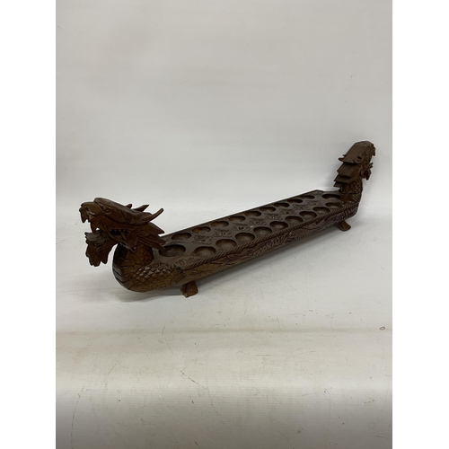 26 - A VINTAGE HARDWOOD ORIENTAL DRAGON SHAPED 'MONCALA' COUNT AND CATCH GAME (NO COUNTERS) - LENGTH 89CM