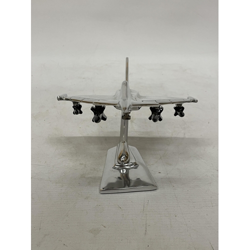 39 - A CHROME MODEL OF A FIGHTER JET, HEIGHT 15CM, LENGTH 21CM