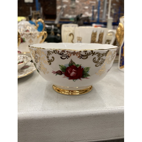 157 - A ROSLYN CHINA RED ROSE AND GOLD GILT TEASET TO INCLUDE A TEAPOT, SUGAR BOWL, CUPS, SAUCERS AND SIDE... 