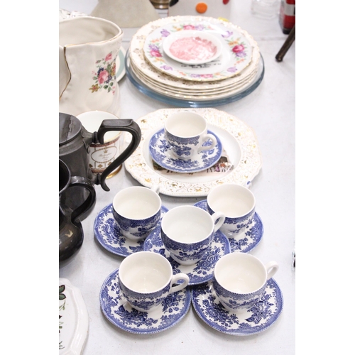 206 - A MIXED LOT TO INCLUDE BLUE AND WHITE CUPS AND SAUCERS, APEWTER TEAPOT, NOVELTY TEAPOTS, WOODEN DUCK... 