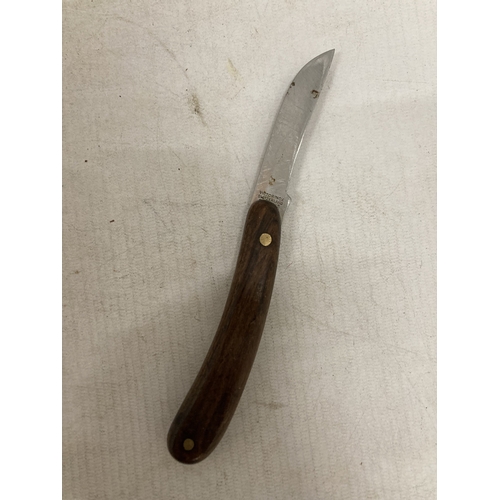 219 - A VINTAGE SWISS MADE 'VICTORINOX' PRUNING KNIFE