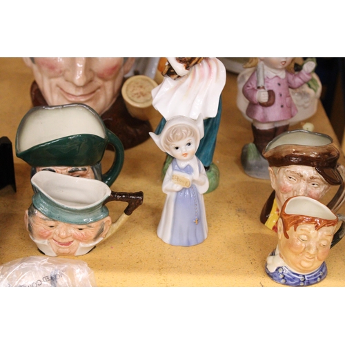 308 - AN ASSORTMENT OF CERAMIC LADY FIGURES, TOBY JUGS, ETC