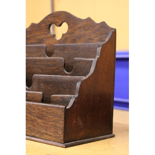 320 - A VINTAGE OAK STATIONERY LETTER RACK