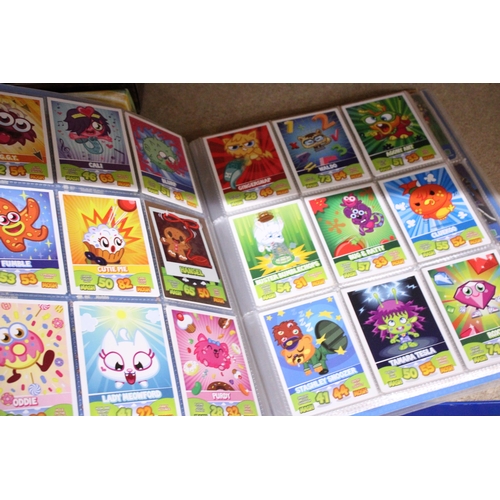 335 - A MOSHI MONSTERS, MASH UP CODE BREAKERS TRADING CARD BINDER AND CARDS