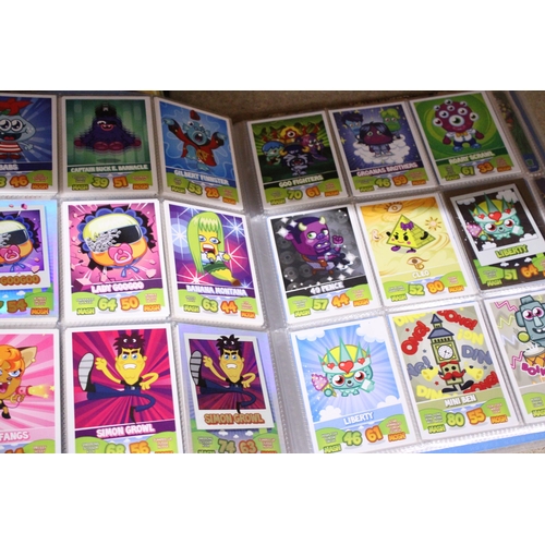 335 - A MOSHI MONSTERS, MASH UP CODE BREAKERS TRADING CARD BINDER AND CARDS