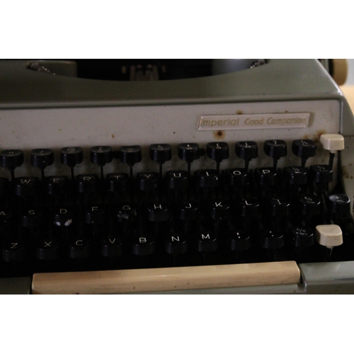 402 - A CASED IMPERIAL GOOD COMPANION MANUAL TYPEWRITER TOGETHER WITH A TRIUMPH TIPPA TYPEWRITER