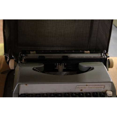 402 - A CASED IMPERIAL GOOD COMPANION MANUAL TYPEWRITER TOGETHER WITH A TRIUMPH TIPPA TYPEWRITER