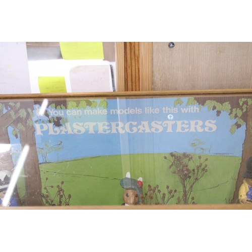 413 - A PLASTERCASTERS DISPLAY TO INCLUDE PADDINGTON BEAR AND BEATRIX POTTER FIGURES IN A LARGE GLASS DISP... 