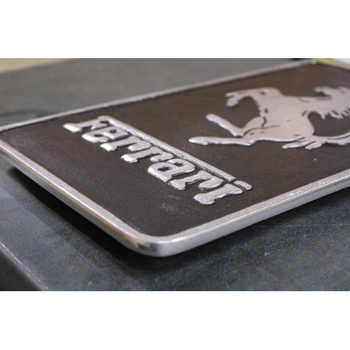 423 - A CHROME FERRARI WALL PLAQUE, 30CM X 17CM