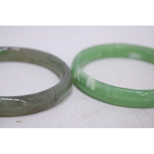 430 - TWO JADE BANGLES