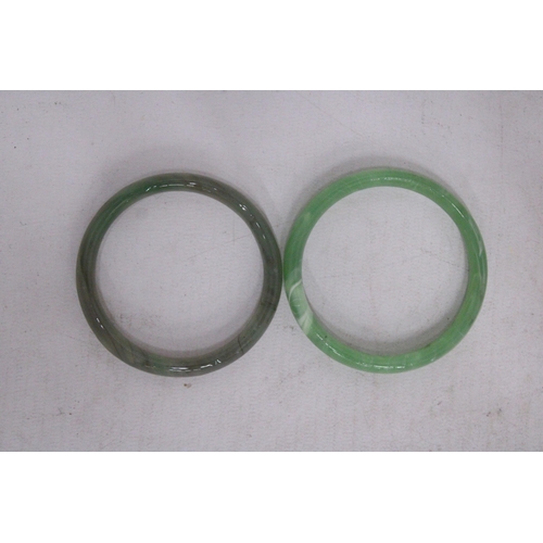 430 - TWO JADE BANGLES