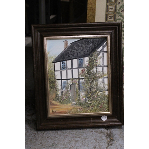 478 - A FRAMED OIL PAINTING OF A COUNTRY COTTAGE SIGNED P.R. FREEMAN TOGETHER WITH A FRAMED CROSS STITCH C... 