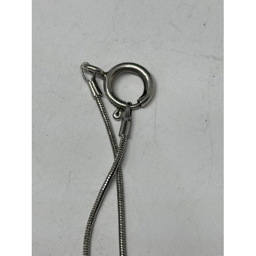 541 - A SILVER ZODIZC ARIES PENDANT ON A CHAIN