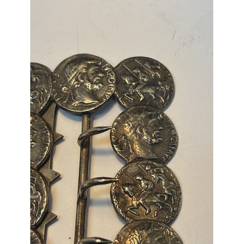 648 - A BUCKLE MADE OF VINTAGE COINS