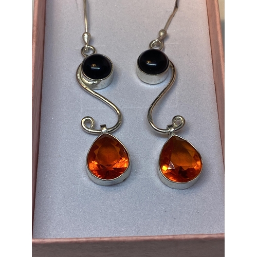 688 - A PAIR MARKED 925 ONYX FIRE GARNET EARRINGS IN A PRESENTATION BOX