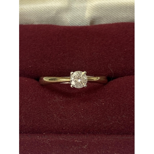 694A - A MARKED 9 CARAT RING WITH 0.33 CARAT SOLITAIRE DIAMOND RING SIZE L IN A PRESENTATION BOX